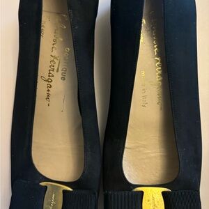 Salvatore Ferragamo 
Black Flats with Gold Accent